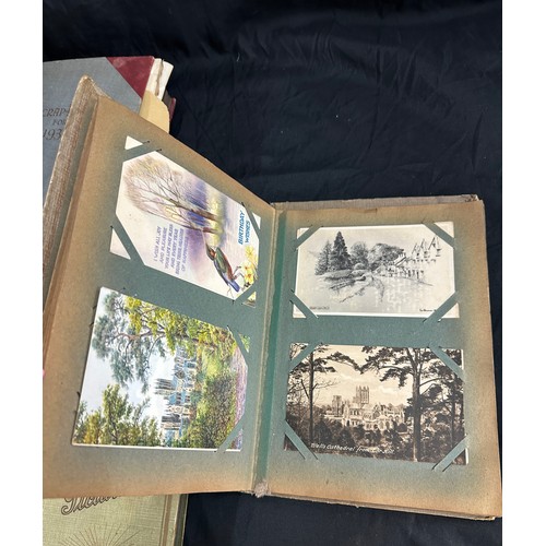 33 - Vintage photo albums with old photographs and a vintage cigarette card album