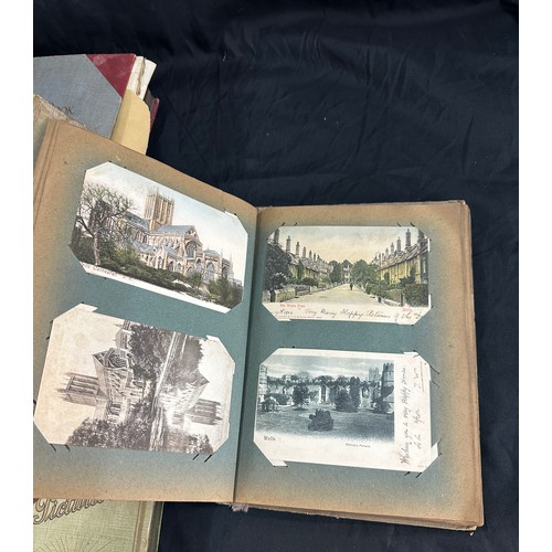 33 - Vintage photo albums with old photographs and a vintage cigarette card album