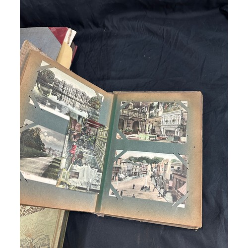 33 - Vintage photo albums with old photographs and a vintage cigarette card album