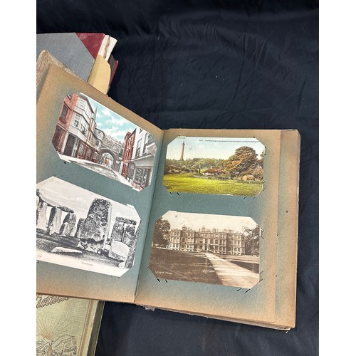 33 - Vintage photo albums with old photographs and a vintage cigarette card album