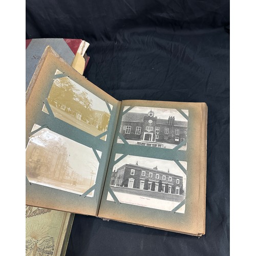 33 - Vintage photo albums with old photographs and a vintage cigarette card album