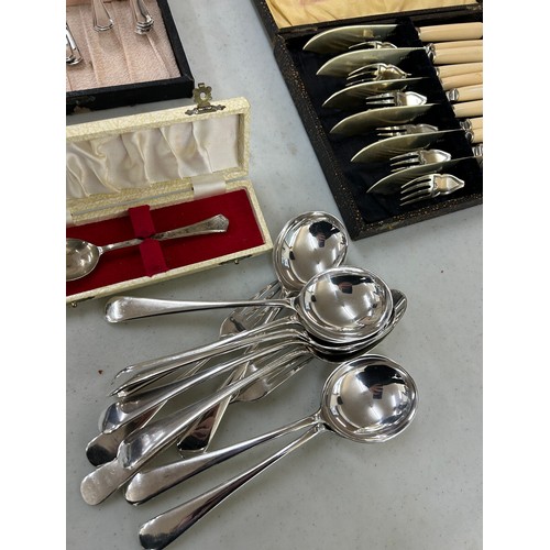 62 - Selection EPNS cutlery sets, together with a silver  cased teaspoon