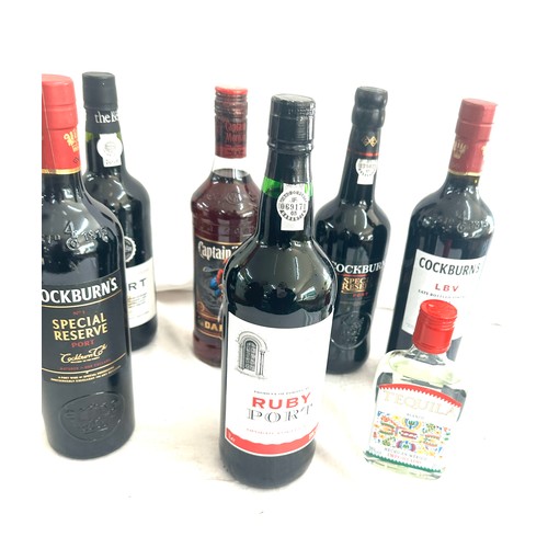 574 - Selection of sealed alcohol to include Captain Morgains, Port, Tequilia etc