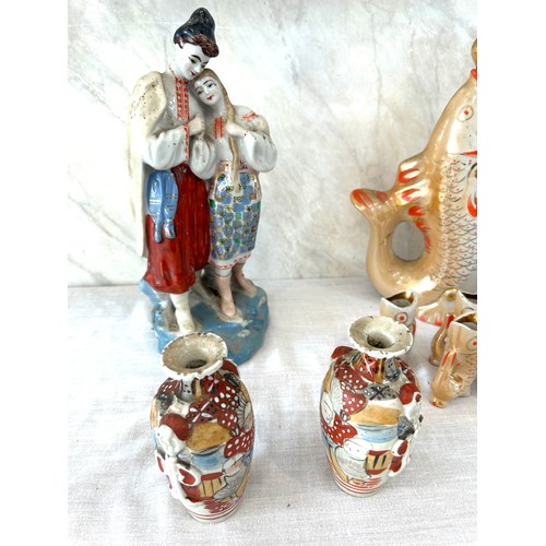 35 - Selection of porcelain miscellaneous to include Sake Koi fish decanter and cups, porcelain figure an... 