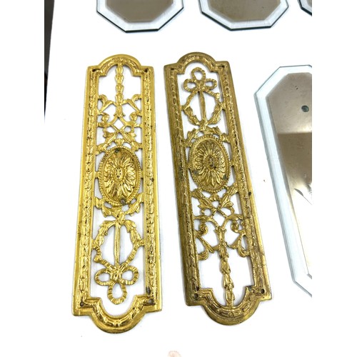 29 - Nine vintage glass finger plates and 2 brass ones