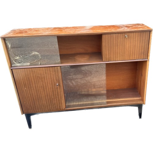 292 - 1960s Nathan Walnut cocktail cabinet with sliding glass doors, measures approximately 39 inches tall... 