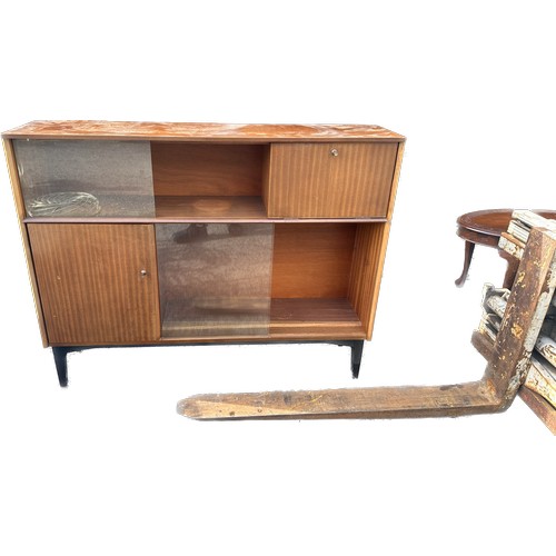 292 - 1960s Nathan Walnut cocktail cabinet with sliding glass doors, measures approximately 39 inches tall... 