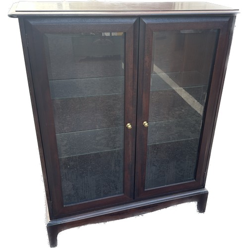 301 - Stag glazed bookcase with glass shelves measures approximately 39 inches tall 32 inches wide 11 inch... 