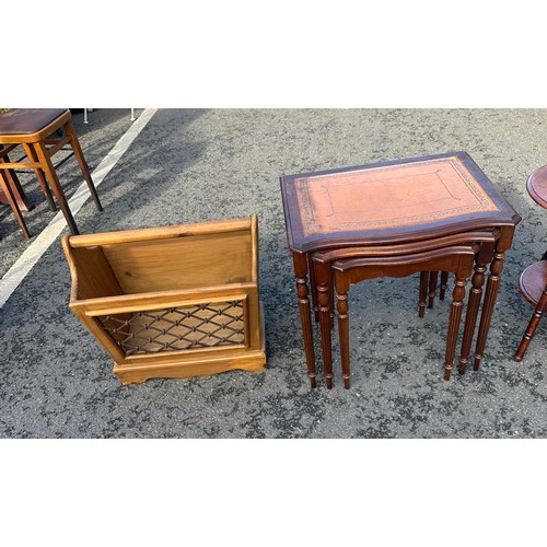 315 - Mahogany nest of leather topped tables, pine magazine rack and a occasional table largest measures 2... 