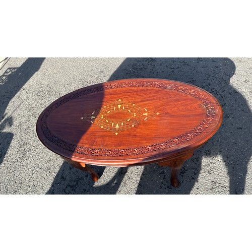 346 - Brass inlaid carved occasional table measures 19inches tall 37 inches wide 19 inches depth