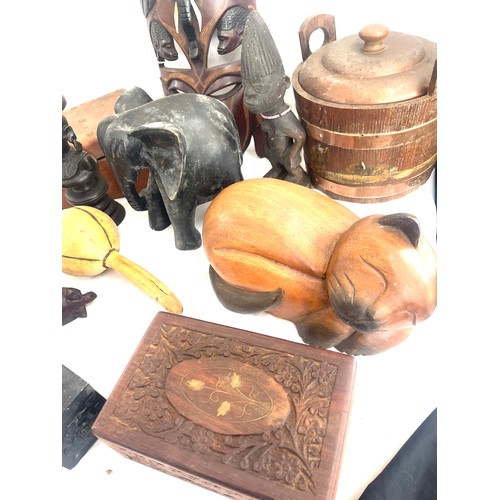 280 - Selection of assorted wooden items includes carved wooden items, ice bucket, mask, boxes etc