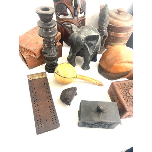 280 - Selection of assorted wooden items includes carved wooden items, ice bucket, mask, boxes etc