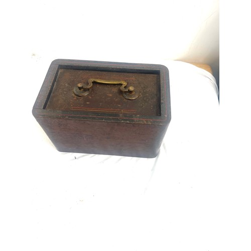 101 - Antique cast iron lockable money box with key, approximate measurements: 6 inches tall by 10 wide an... 