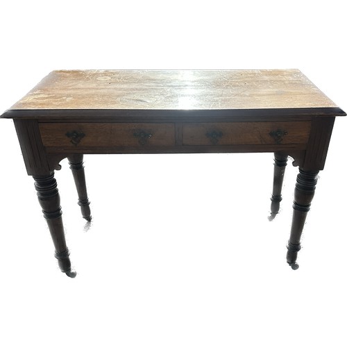 347 - Edwardian console table on castors measures approx 29 inches tall by 43 inches wide