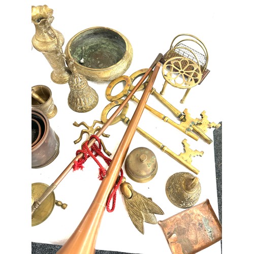 175 - Large selection of vintage and later brassware includes persian items, hunting horn, candle sticks e... 