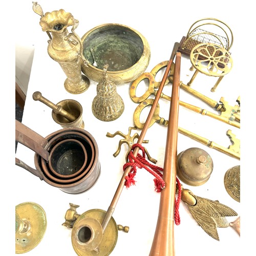 175 - Large selection of vintage and later brassware includes persian items, hunting horn, candle sticks e... 