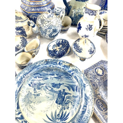 135 - Large selection of antique and later blue and white pottery