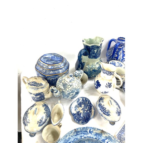 135 - Large selection of antique and later blue and white pottery