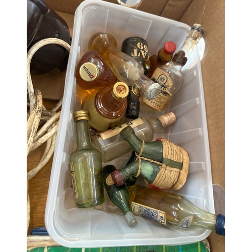 105 - Selection of miscellaneous includes alcohol miniatures, hair dryer etc