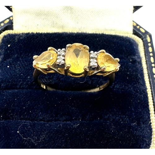 98 - 9ct Gold Citrine Three Stone Ring With Diamond Spacers (2.2g)