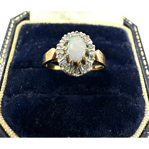 82 - 9ct Gold Diamond & White Opal Oval Halo Ring (2.3g)