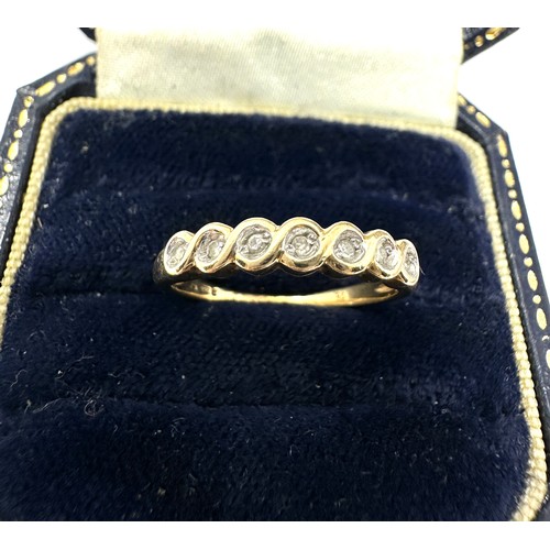 63 - 9ct Gold Diamond Seven Stone Ring (2g)