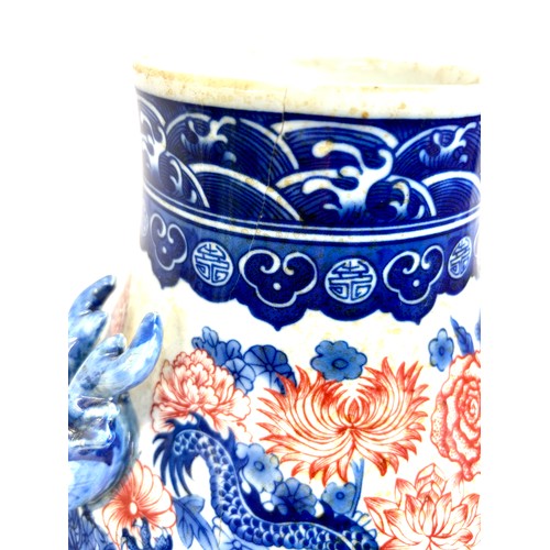 553 - Oriental blue and white vase, red dragon detailing, overall height: 14 inches