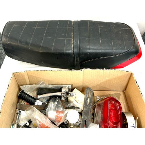 231 - Honda motorbike leather set, selection of bike motor spares etc