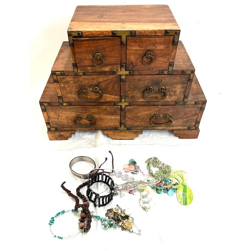 63 - Vintage 6 drawer jewellery cabinet measures approximately 12 inches tall 17 inches wide 6.5 inches d... 