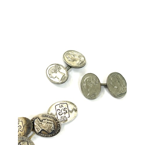 449 - Queen victoria commemorative cufflinks 1897 and a pair of george VI cufflinks