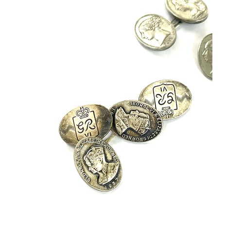 449 - Queen victoria commemorative cufflinks 1897 and a pair of george VI cufflinks