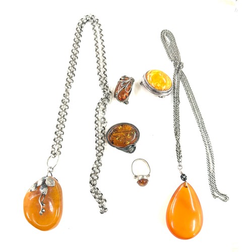 453 - Vintage silver and amber jewellery to includes brooch, pendant, ring etc, gross weight 102grams size... 