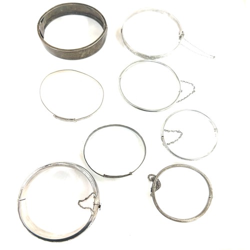 472 - 8 antique and vintage sterling silver bangles various makers and ages gross weight 96grams