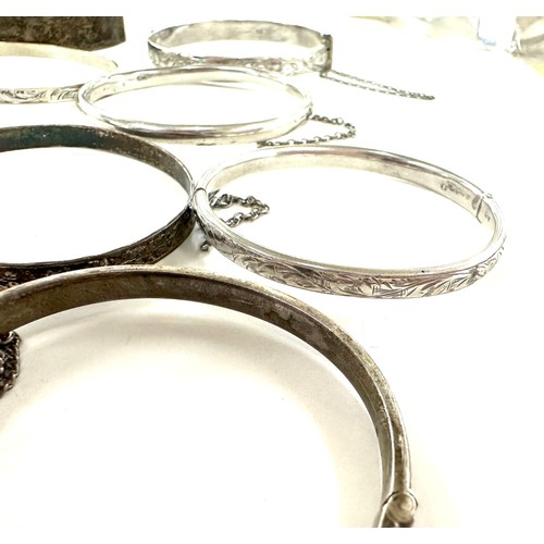 472 - 8 antique and vintage sterling silver bangles various makers and ages gross weight 96grams