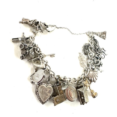 473 - Good Vintage silver charm bracelets weight 76 grams