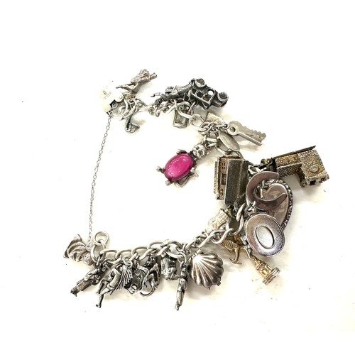 473 - Good Vintage silver charm bracelets weight 76 grams