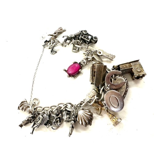 473 - Good Vintage silver charm bracelets weight 76 grams