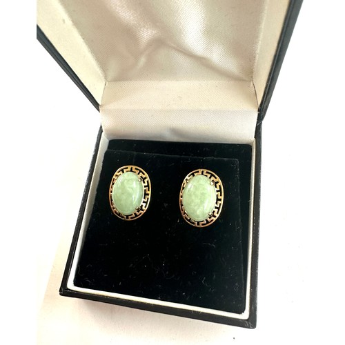 490 - 9ct gold and jade vintage earrings gross weight 3.9grams size 1.8cm by 1.4cm