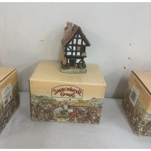 122 - Selection of David Winter cottages all boxed  to include Britian's traditions, some with COA