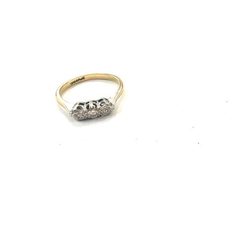 478 - Ladies 18ct gold and platinum diamond trilogy ring total weight 2.2 grams