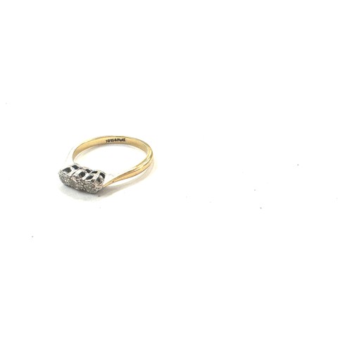 478 - Ladies 18ct gold and platinum diamond trilogy ring total weight 2.2 grams