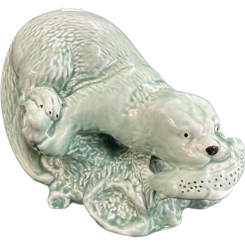 14 - Green Sylvac otter, 7 inches tall by 9 inches wide