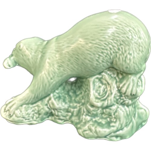 14 - Green Sylvac otter, 7 inches tall by 9 inches wide