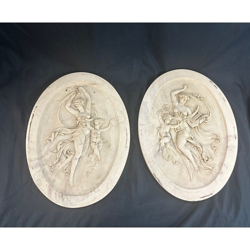 84 - 2 Vintage oval marble wall plaques, cherub design, each measures approximately 13 inches tall 10 inc... 