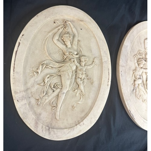 84 - 2 Vintage oval marble wall plaques, cherub design, each measures approximately 13 inches tall 10 inc... 