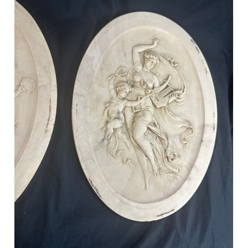 84 - 2 Vintage oval marble wall plaques, cherub design, each measures approximately 13 inches tall 10 inc... 