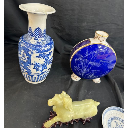 82 - Selection of oriental items includes Vase, 2 small plates, Jade horse on wooden stand etc