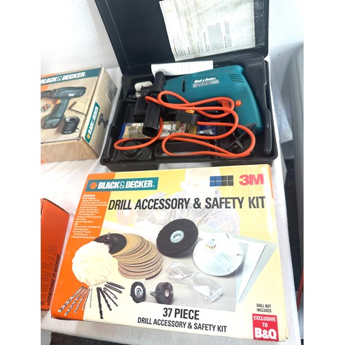 185 - Selection of black and decker tools to include drill, drill accessories and safety kit etc