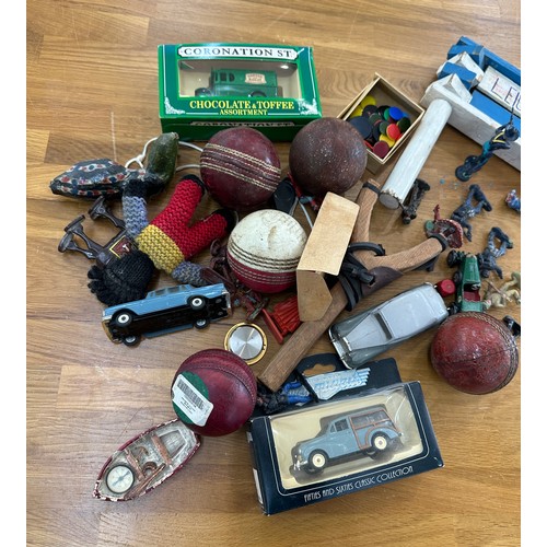 142 - Selection of collectable items includes cricket balls vintage cars, figures etc