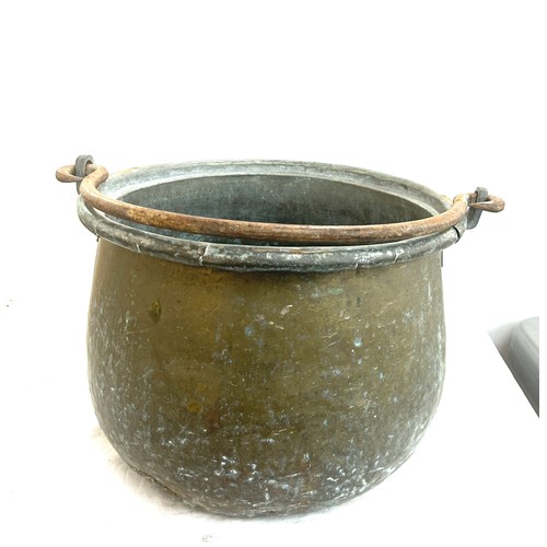 258 - Antique brass cauldron measures approximately 15  inches wide 11 inches tall